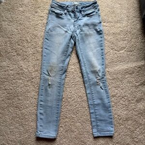 YMI Girl Size 8 Youth Light wash skinny jeans with tears
